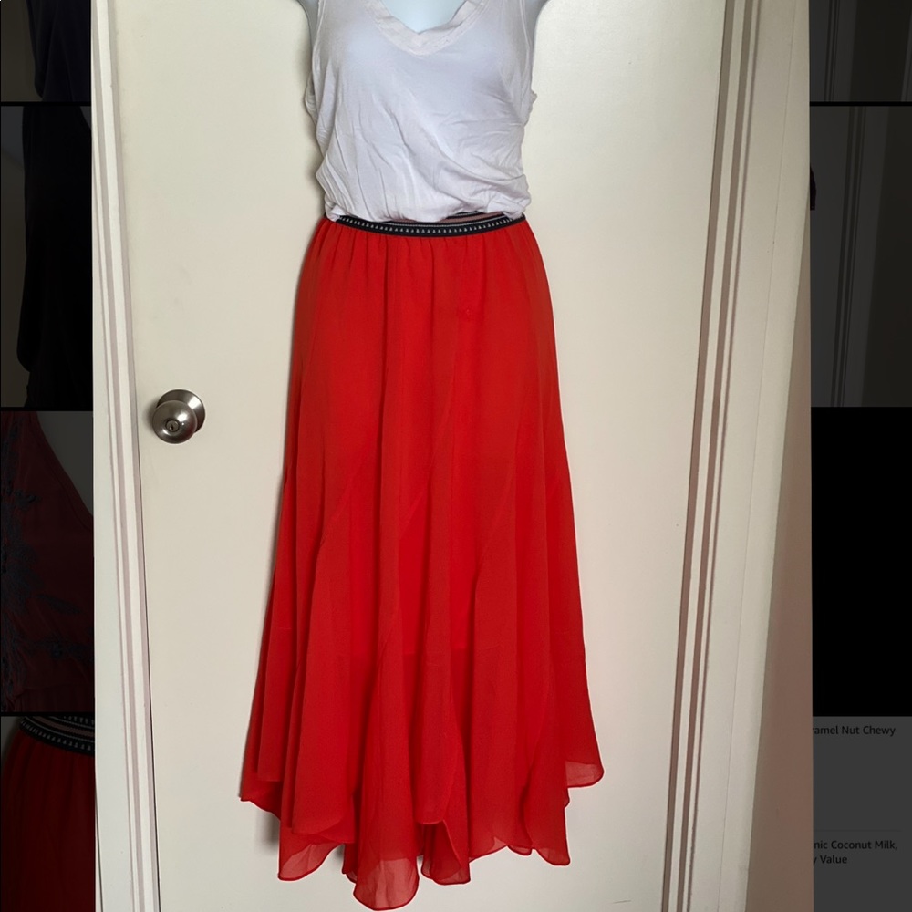 Flowy long orange skirt. Anthropologie.